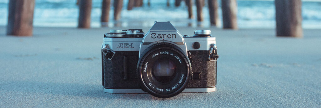 canonae1header 1536x518 - Canon is actively conducting market research on a "retro" style camera body